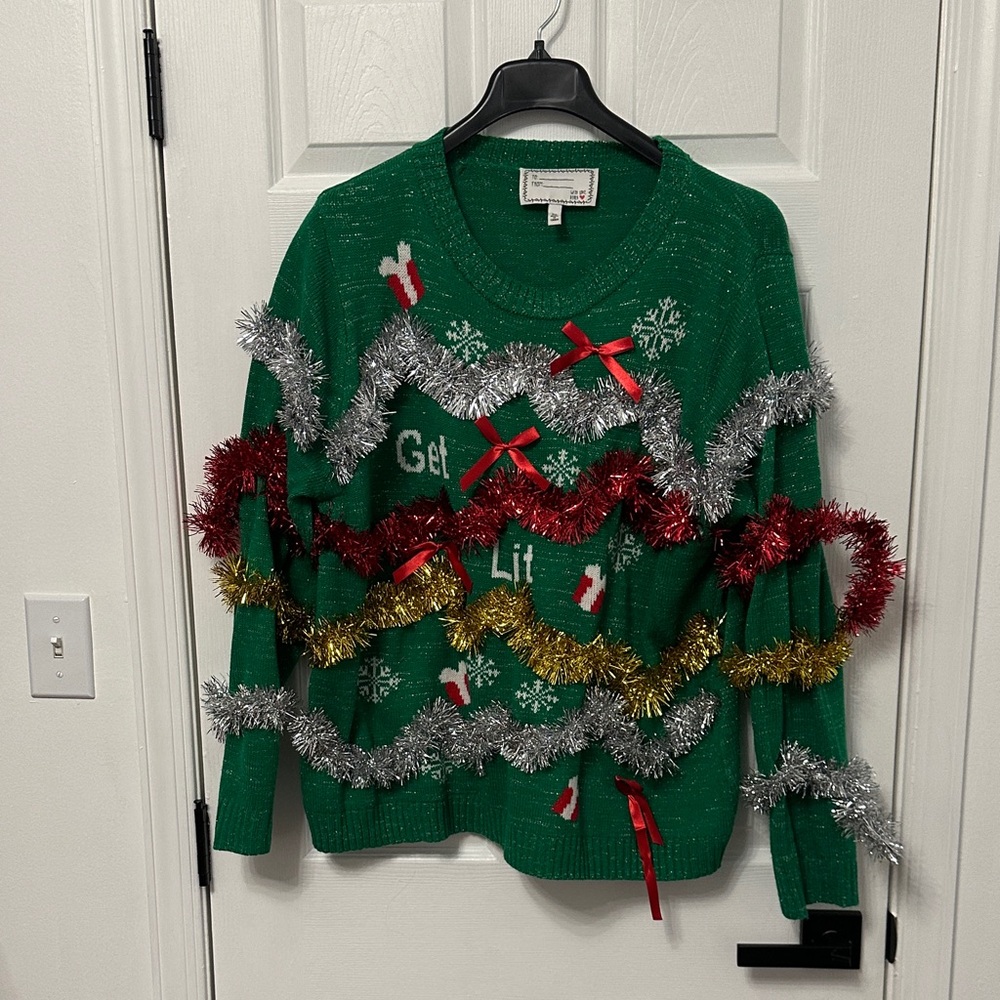 Green Holiday Sweater with Festive Tinsel Accents
